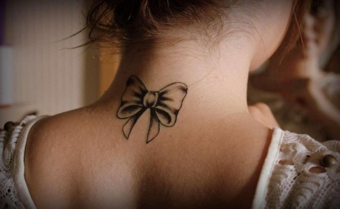 A neat bow on a refined female neck