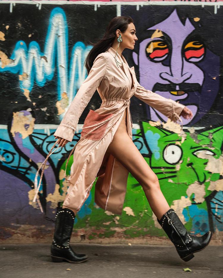 Alena Vodonaeva against the graffiti background