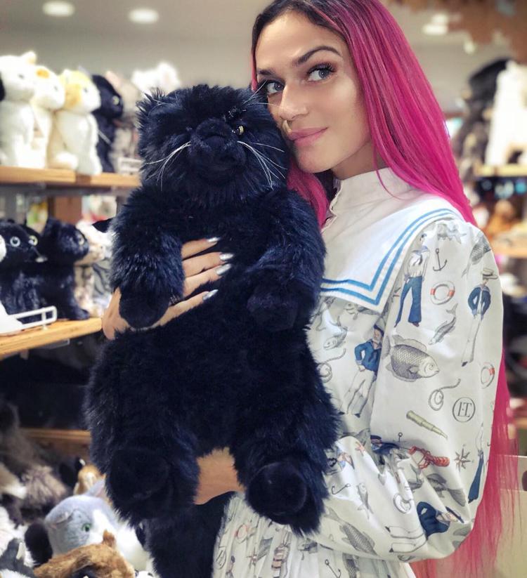Alena Vodonaeva with a toy cat
