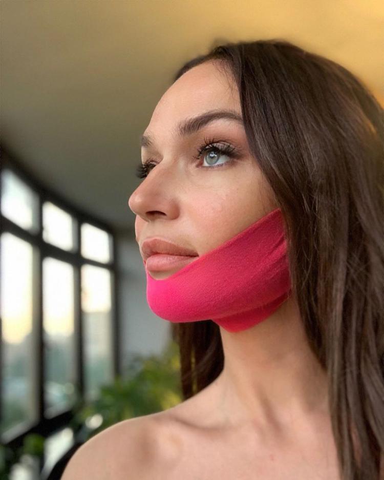 Alyona Vodonaeva with a pink armband