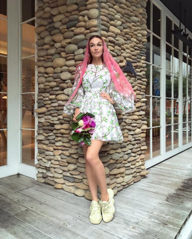 Alena Vodonaeva in a floral dress