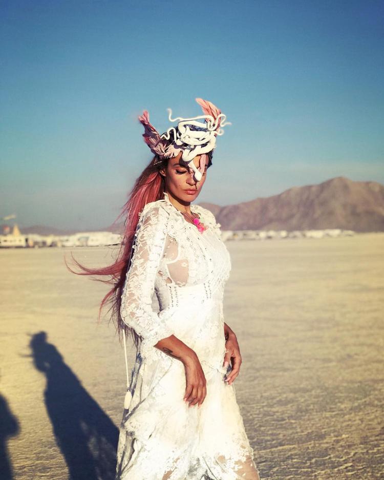 Alena Vodonaeva as a white snake