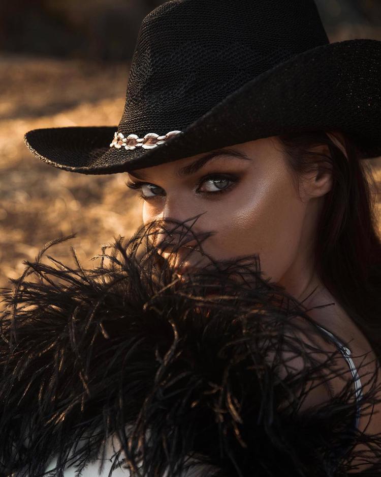 Alena Vodonaeva in a hat