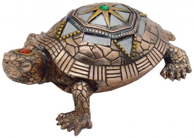 Turtle for protection and giraffe for success: meaning of figurines symbolism