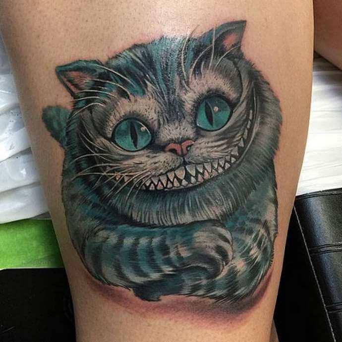 cheshire cat tattoo meaning