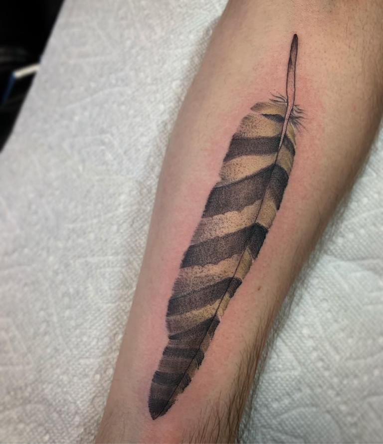 ce que signifie le tatouage de la plume