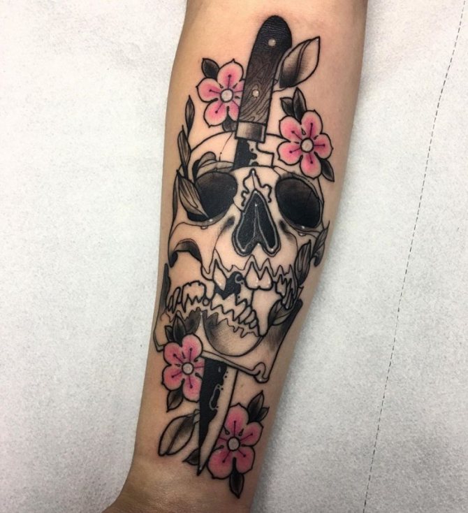 Que signifie le tatouage du couteau ?