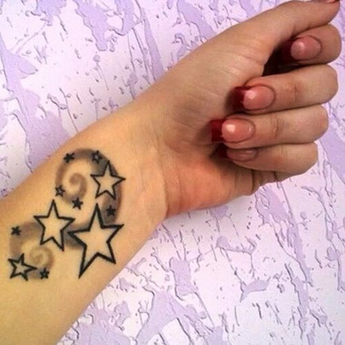 Sketches of tattoos for girls on the arm. Small inscriptions, flowers, geometry, bracelet