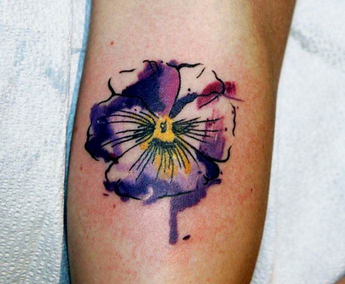 violet flower on foot