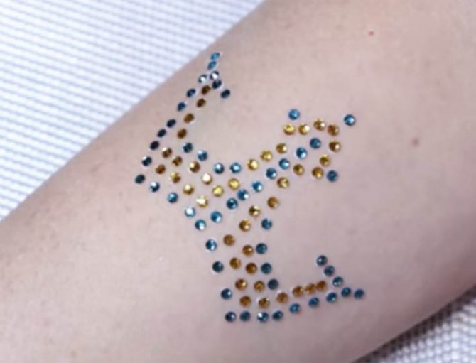 татуировка с кристали