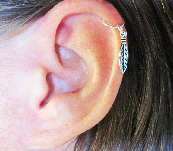 Perçage d'oreille Helix. Photos, boucles d'oreilles, comment faire, soins