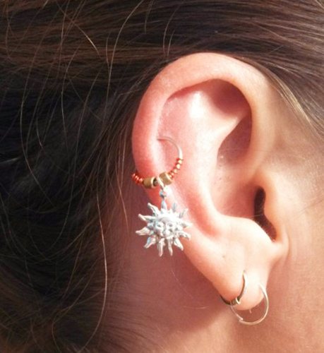 Pistolet à percer les oreilles Helix. Photos, boucles d'oreilles, comment faire, soins
