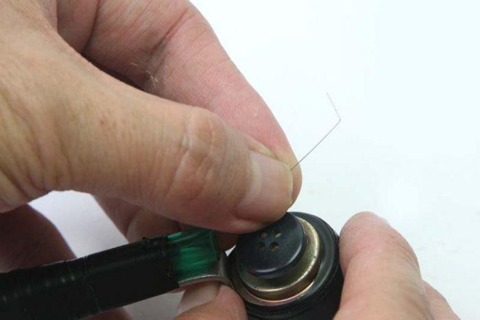 L'extrémité de la corde est pliée