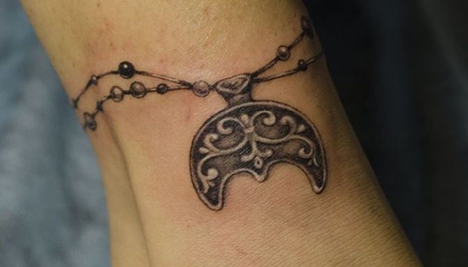 Tatouage de jambe réaliste de MoonGirl