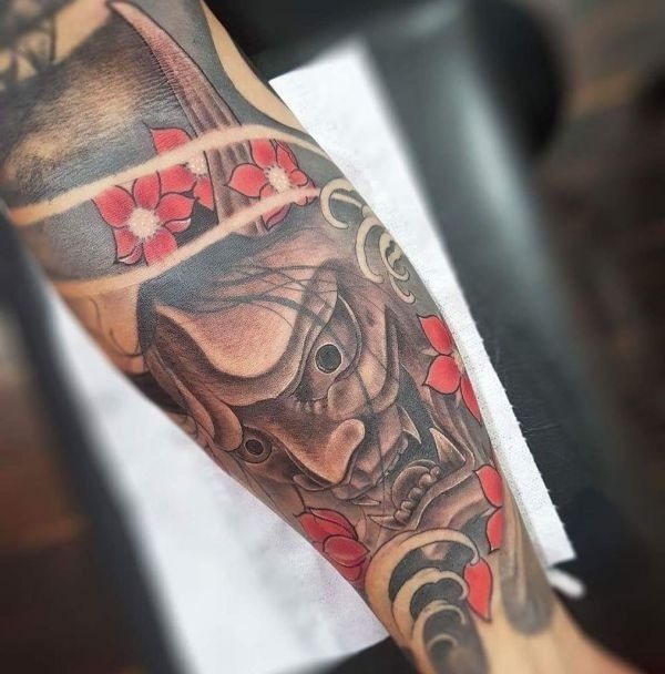 Mask of Chania. Sketch, meaning of a tattoo on a forearm, back, hand, leg, shoulder