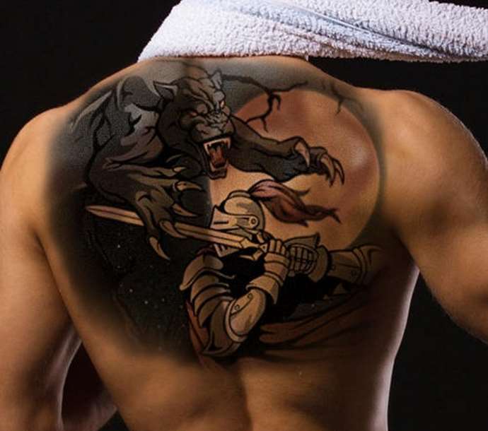 a man with a tattoo on his back