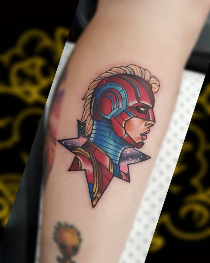 Small tattoo of Captain Marvel