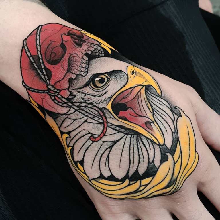 Eagle on the brush with a skull