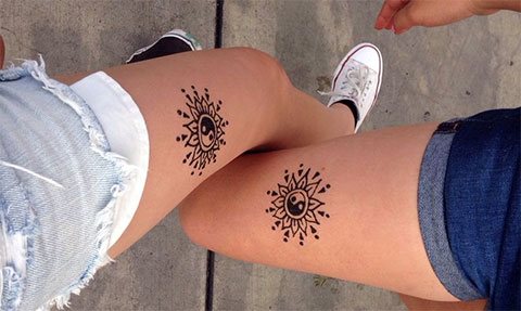 Tatouage du soleil en paire