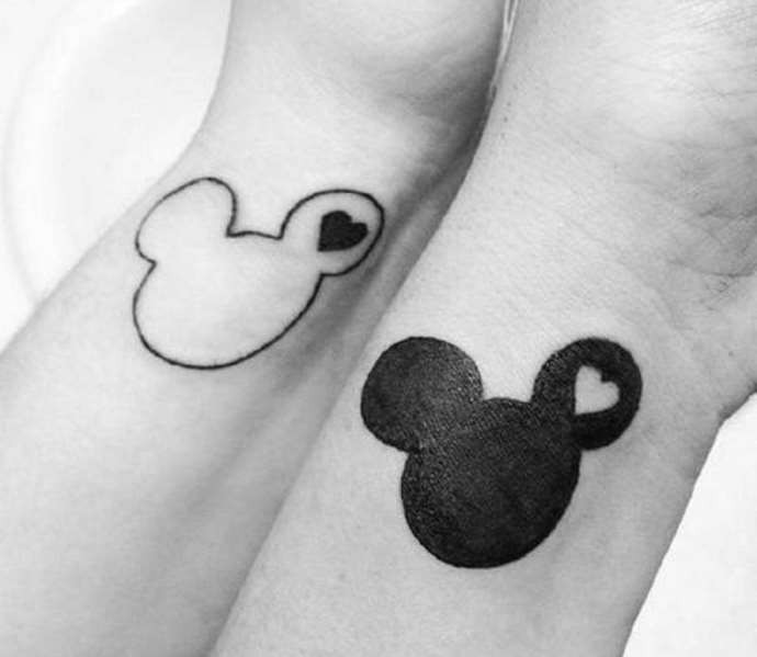 paired tattoo with Mickey Mouse