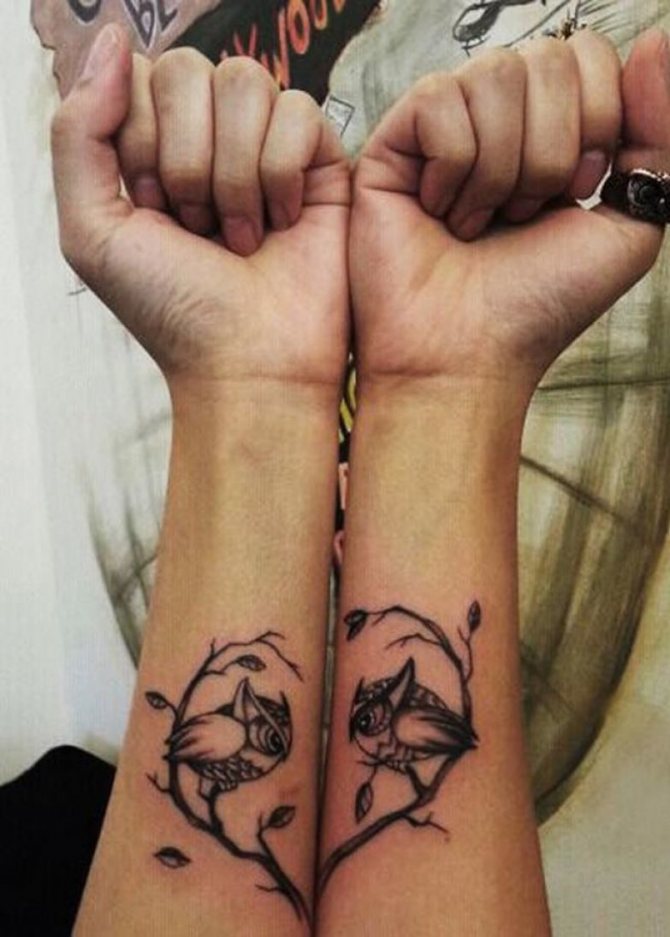 Tattoo of owls in pairs