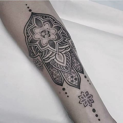 Fatima arm tattoo on a girl