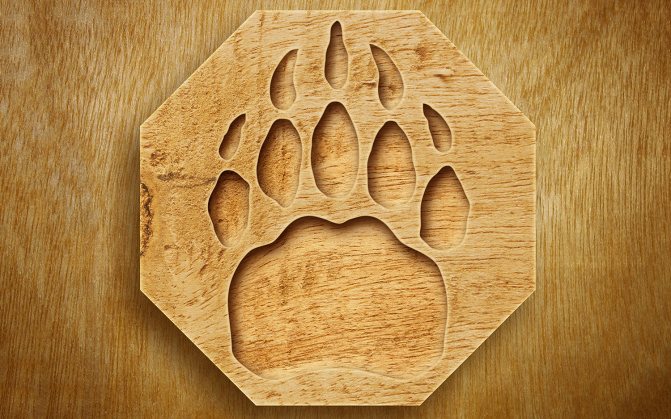 Symbol Velesu ve dřevě