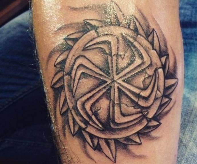 Symbole slave sur la jambe