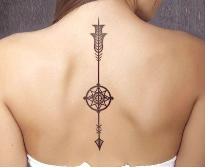 arrow on a girl's spine