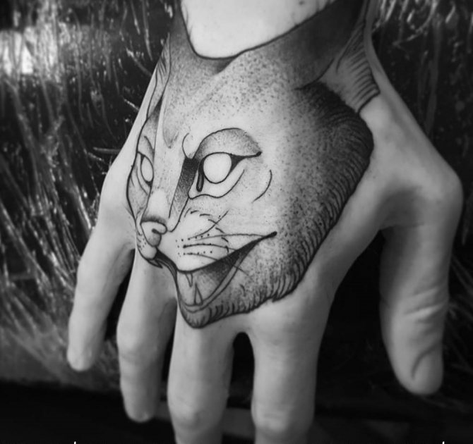 Tatouage d'un chat agressif dans le style Dotwork