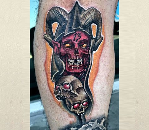 Tattoo demon on legs