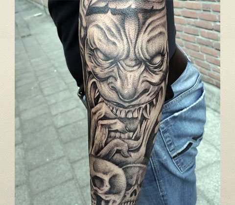 Tattoo demon on hands