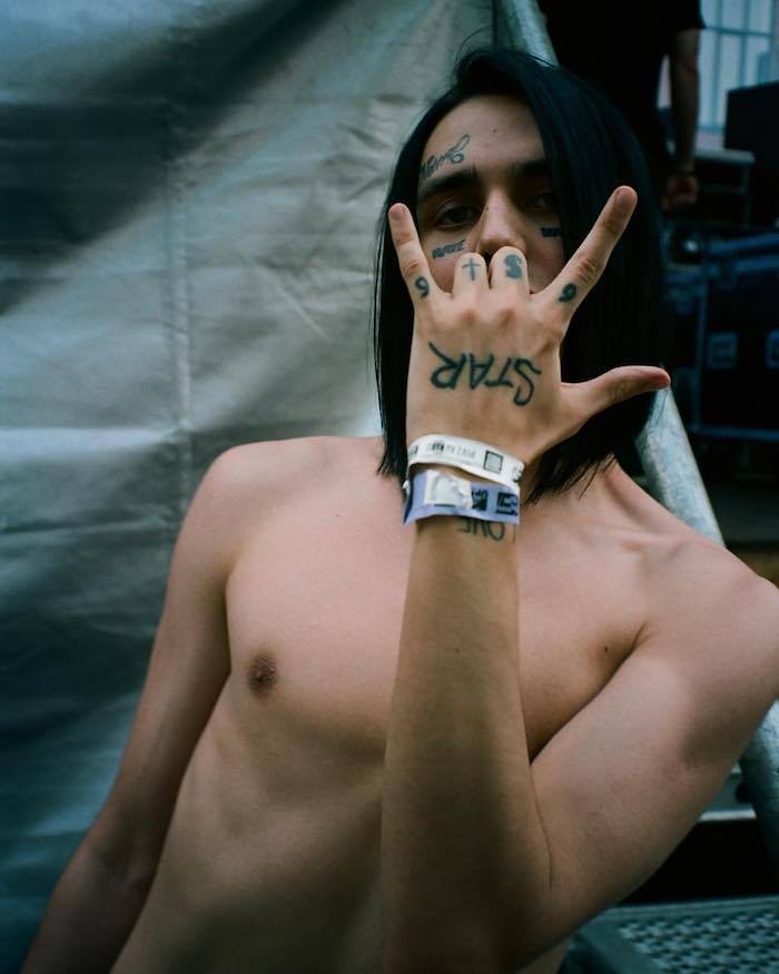 Tatuajes de caras en los brazos