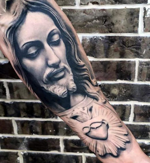 Tatuaje Jesucristo en la mano