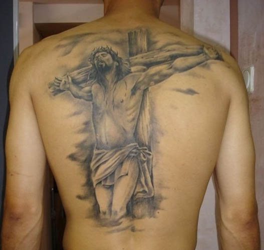 Tatovering af Jesus på arm, ryg, skulder, bryst. Betydning, på korset, med djævelen, maskine, due, due