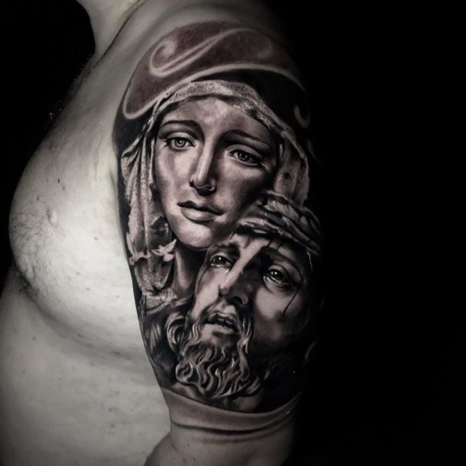 tatuaje de jesús en el brazo