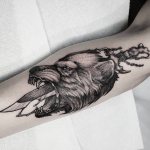 Tattoo of Dagger and Wolf