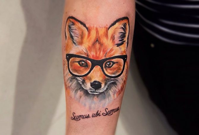Fox tattoo on hand with glasses