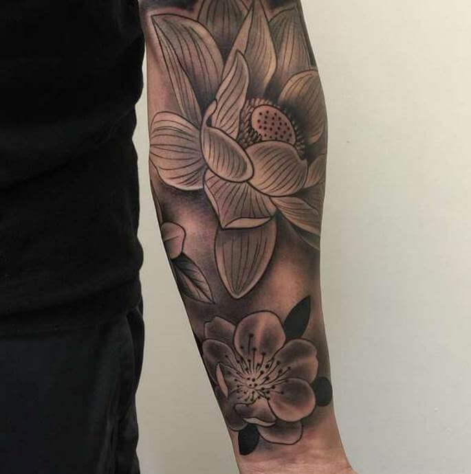 lotus tatuointi kädessä merkitys