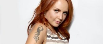 Tätowierung von Maxim auf seiner Schulter