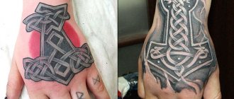 Tattoo Thor's Hammer. Signature on the arm, hand, back, shoulder, leg, photo