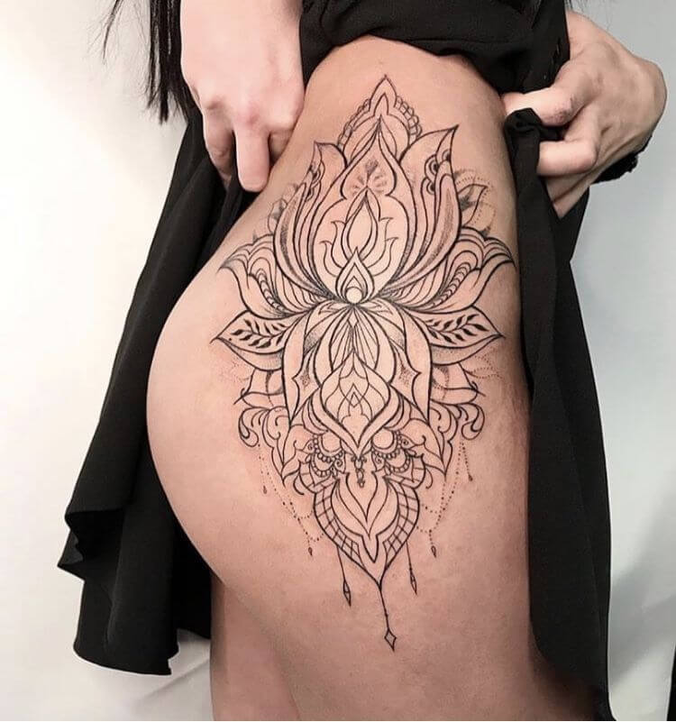 lotus tattoo on the hip