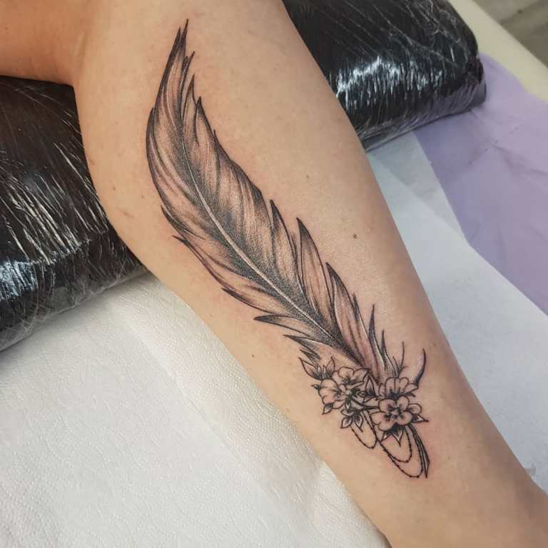 Tattoo on a leg for a girl