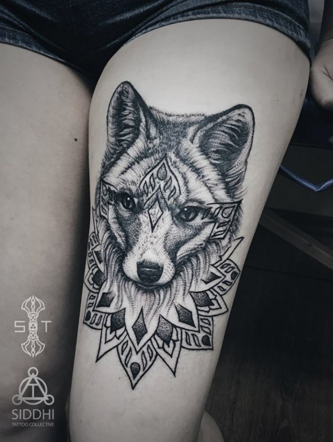 Tattoo on legs Fox graphic