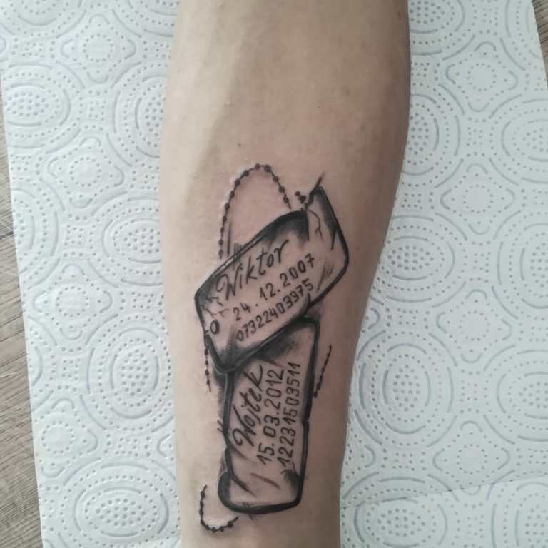 Tätowierung eines Sohnes