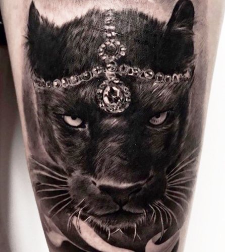 Tatouage panthère pour filles. Signification, photo, sur bras, jambe, épaule, dos, bas du dos