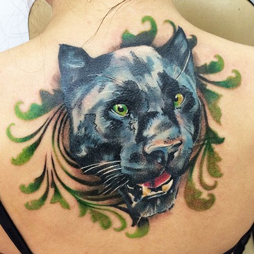 Tatouage de panthère pour les filles. Signification, photo, sur bras, jambe, épaule, dos, bas du dos, omoplate