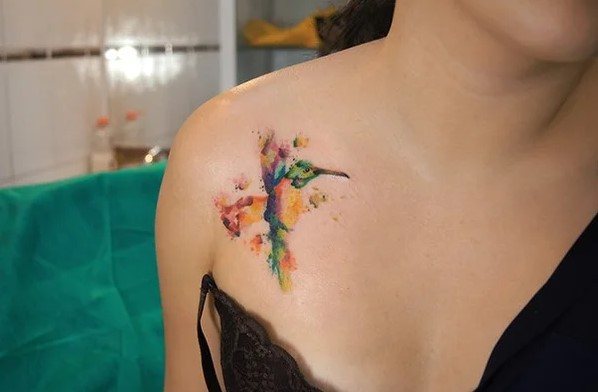 Tattoo birds on the collarbone. Picture, meaning, sketches