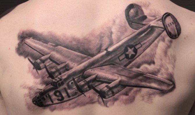 airplane tattoo on his back