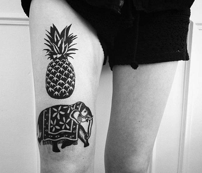 Tattoo Elefant mit Ananas am Bein